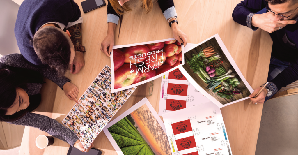 Customers press checking their printed items.